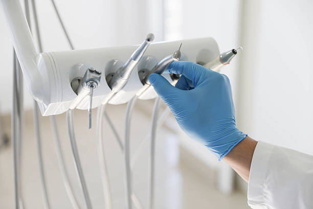 Professional Tooth Extraction technician working in Midland, MI